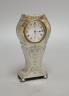 A George V engraved silver mounted mantel timepiece, on ball feet, Birmingham, 1912, 13.2cm                                                                                                                                 