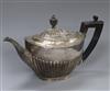 A late Victorian demi fluted silver teapot, Sheffield, 1897, gross 12 oz.                                                              