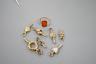 An early 20th century 9ct and carnelian set ring, size K/L, gross 2.7 grams and seven assorted watch keys including three set with chalcedony.                                                                              