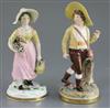 A matched pair of Rockingham porcelain figures of a Swiss boy and Swiss girl, c.1830, h. 21cm and 19.5cm, small losses                 