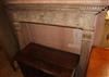 A carved pine fire surround W.138cm                                                                                                    