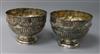 A near pair of silver pedestal rose bowls, half-fluted and embossed with ribbon-tied swags                                             