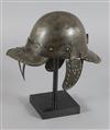 A Cromwellian helmet,                                                                                                                  