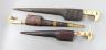 A group of three Indo-Persian daggers, longest blade 26cm, each within sheath                                                                                                                                               
