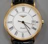 A gentleman's 1999 18ct Longines quartz date wrist watch, with box and papers, case diameter 33mm, gross weight 29.1 grams.                                                                                                 