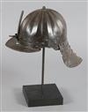 A Cromwellian lobster tail helmet,                                                                                                     