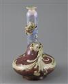 Mark V Marshall for Doulton lambeth, a flambe bottle vase entwined by a mythical beast, c.1885, 19cm, restored                         