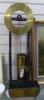 A 17th century style oak and brass 'Clepsydra' or water clock                                                                                                                                                               