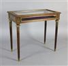 An early 20th century French ormolu mounted mahogany display table, W.2ft 9in. D.1ft 6in. H.2ft 6in.                                   