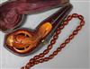 A Meerschaum pipe and bead necklace                                                                                                    