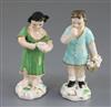 A pair of Rockingham porcelain figures of a beggar boy and girl, c.1830, h. 12.5cm                                                     