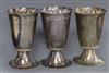 A pair of QE II hammered silver goblets, H. Phillips, London, 1952 and one other silver goblet, 11 oz.                                 