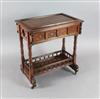 A Victorian Gillow walnut and marquetry work table, c.1865-70, the design attributed to Charles Bevan, W.2ft 4in.                      