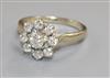 A white metal and nine stone diamond cluster dress ring, size X.                                                                       