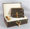 A large Louis Vuitton suitcase, 21in.                                                                                                  