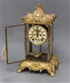 An American four glass rococo clock height 37cm                                                                                        