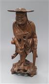 A Chinese wood figure of a luohan, early 20th century height 36cm                                                                      