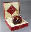 A bottle of Rémy Martin Louis XIII Grande champagne cognac,                                                                            