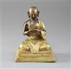 A Chinese gilt copper seated figure of a luohan, probably Qing dynasty, height 15cm                                                    