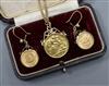 An Italian 9ct gold bracelet hung with a mounted gold half sovereign and a pair of yellow metal Dos Pesos coin set earrings.           