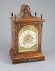 A late 19th century walnut cased bracket clock, 38cm high                                                                                                                                                                   