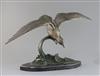 Irene Rochard. An Art Deco bronze model of a seagull flying above waves, height 15in.                                                  