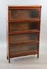 A Globe Wernicke mahogany four section bookcase, W.86.5cm D.27cm H.143cm                                                                                                                                                    