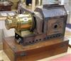 A magic lantern by Riley Brothers and a collection of magic lantern slides                                                             