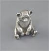 An Edwardian novelty silver pin cushion, modelled as a seated bear, Boots Pure Drug Company, 38mm.                                     