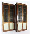 A suite of five Regency rosewood and brass mounted library bookcase cabinets, overall W.25ft 4in. approx.                              