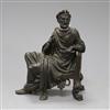 A French 19th century bronze figure of a seated classical scholar, H 20.5cm W 17cm                                                     