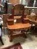 A Victorian satin walnut duchess dressing table, width 89cm, depth 44cm, height 132cm                                                                                                                                       