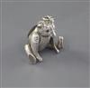 An Edwardian novelty silver pin cushion, modelled as a bear with articulated limbs, H.V. Pithey & Co, 44mm.                            