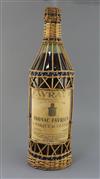 A 5 litre bottle of Cognac Favraud Chateau de Souillac, height 20in.                                                                   