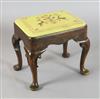 An early 18th century red walnut stool, W.1ft 6in. D.1ft 2in. H.1ft 4in.                                                               