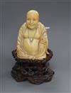 A Chinese ivory figure of a Budai, on stand H.13cm                                                                                     