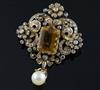 A 19th century gold, citrine, diamond, emerald? and drop pearl set pendant brooch,                                                     