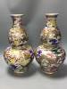 A pair of Chinese famille rose double gourd-shaped vases, height 40cm                                                                                                                                                       