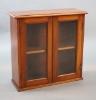 A small Edwardian mahogany wall cabinet, W.58cm D.21cm H.57cm                                                                                                                                                               