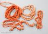 Four assorted coral bead necklaces, largest 148cm and a coral bead bracelet.                                                                                                                                                