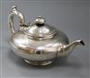 A Victorian silver teapot, of flattened circular form, London 1844, maker George Ivory, 22.5oz                                         