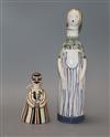 A Rye Pottery 'Miss Simplicity' oil/vinegar bottle and a Bernard Moss Mevagissey Pottery nodding figure (a.f.) tallest 29cm            