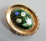 A 1960's 9ct gold and polychrome enamel set oval pendant locket, 42mm, gross 14 grams.                                                                                                                                      