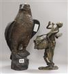 A bronze model of an eagle and a bronze figure                                                                                         