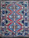 A Caucasian Kazak red and blue ground rug, 7ft 4in by 6ft 2in.                                                                         