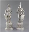 A pair of early 20th century German parcel gilt silver & card ivory figures, modelled as Knights, gross 47 oz.                         