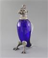 A late Victorian silver plate mounted blue glass novelty claret jug, modelled as a parrot, 29.5cm.                                     