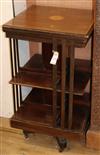 An Edwardian inlaid mahogany revolving bookcase W.50cm                                                                                 