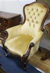 A Victorian mahogany buttonback armchair, upholstered in gold velvet                                                                   