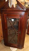 A George III mahogany hanging corner cabinet W.74cm                                                                                    